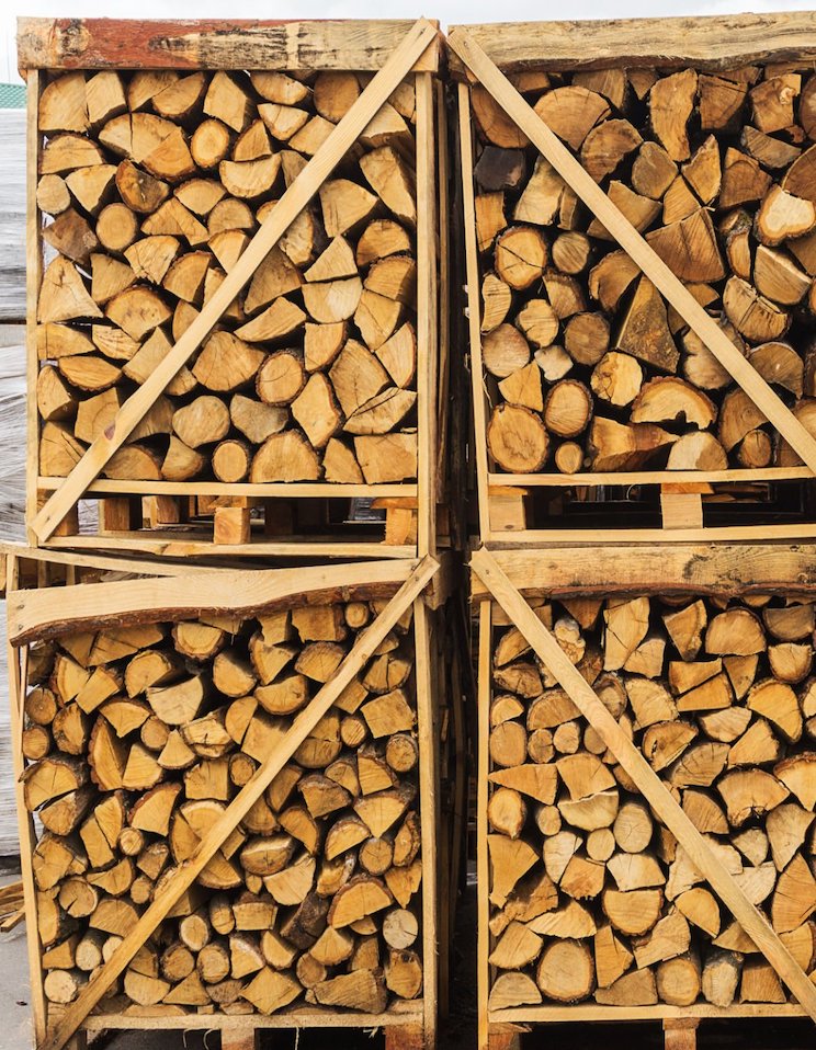 Folded and packaged firewood on pallets